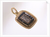 Gold pendant by unknown