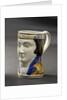 Earthenware mask mug by unknown