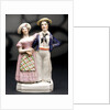 Earthenware figure group depicting a sailor and lass by unknown