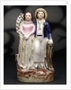 Earthenware figure group depicting a sailor and lass by unknown