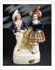 Earthenware figure group depicting a sailor and lass by Unknown