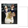 Earthenware figure group depicting a sailor and lass by Unknown