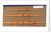 Full hull model, 2 oared single skull, port broadside by unknown