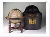 Sphere on stand, beside case by James Ferguson