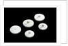 Three large and two small crucible lids by unknown