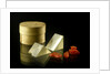 Pill box containing two prisms and red coloured crystals by unknown
