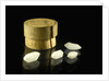 Pill box containing four cloudy white crystals by Unknown