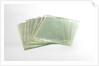Thirteen clean cut glass squares in a box by unknown