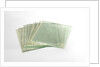 Thirteen clean cut glass squares in a box by unknown