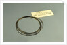 Roll of brass wire in a bag by unknown
