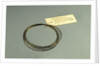 Roll of brass wire in a bag by unknown