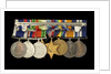Medals awarded to P. S. N. SMITH CPO RN (reverse, r to l, MED1196-1203) by unknown