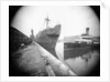 The 'Dotterel' (Br, 1936) alongside berth at Southampton with a damaged bow, slightly distant. The paddle steamer 'Portsdown' (1928) is berthed close by by unknown