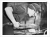 A WREN using an acetylene welder by unknown