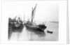 The 'Olive May' (1920), a port quarter view of the barge motoring to quayside with her tender in tow (sails furled) by Anonymous