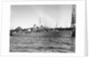 Photograph of starboard view just forward of the broadside of HMS 'Rhododendron' (1940) dated pre October 1942 alongside quay. Pendant K78. by unknown