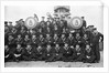 The gun crew of 'A' turret on the forecastle with the barrels of the turret projecting through the group of 'Queen Elizabeth' (1913) by unknown