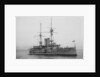 Battleship HMS 'Goliath' (1898), at anchor with awning rigged by unknown