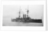 Battleship HMS 'Goliath' (1898), at anchor with awning rigged by unknown