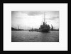 HMS 'Titania' (1915) submarine depot ship, moored at Portland with 4 submarines alongside by unknown