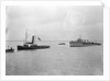 Rescue tug HMS 'Vanquisher' (1899) entering the floating dock at Harwich with the mined destroyer 'Thisbe' (1917) in tow by unknown