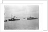 Rescue tug HMS 'Vanquisher' (1899) entering the floating dock at Harwich with the mined destroyer 'Thisbe' (1917) in tow by unknown