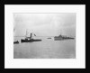 Rescue tug HMS 'Vanquisher' (1899) entering the floating dock at Harwich with the mined destroyer 'Thisbe' (1917) in tow by unknown