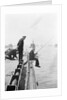 Officer fishing off light cruiser HMS 'Aurora' (1913) by unknown