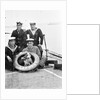 Photograph of four petty officers on board 'Laforey' (1913) at Harwich in 1915-1916 with the ship's dog mascot by unknown