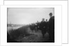 Spectators on the tow path on the south bank of the Thames near Hammersmith Bridge on Boat Race Day, 1907 by unknown