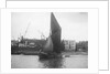 A spritsail barge under way off the Free Trade Wharves by Unknown