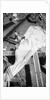Repairing a spread sail on the forecastle by Alan Villiers