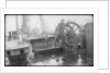 The 'Herzogin Cecile' (Fi, 1902) a seaman at the midships wheel in heavy weather. The helmsman is wearing a safety harness by unknown