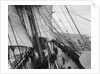 Unbending a topsail by Alan Villiers