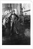 Elisabeth Jacobsen on deck, in oilskins, aboard 4 masted barque 'Parma' (Fi, 1902), ex 'Arrow' (Ruben de Cloux) by Alan Villiers