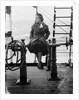 Elisabeth Jacobsenin shore clothes seated on the poop rail, aboard 4 masted barque 'Parma' (Fi, 1902), ex 'Arrow' (Ruben de Cloux) by Alan Villiers