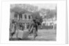 Two Chinese men carrying a load suspended from a pole between them by Kenneth Hurlstone Jones