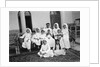 A Kuwaiti merchant at home with his family by Alan Villiers