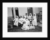 A Kuwaiti merchant at home with his family by Alan Villiers
