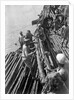 Unloading mangrove poles from the 'Triumph of Righteousness' by Alan Villiers