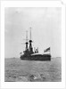 Battleship HMS 'Bellerophon' (1907) at anchor at Spithead, with awning rigged aft by unknown