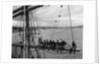 'Fahrwohl' 3 masted barque. Crew sitting on the mainyard. by unknown