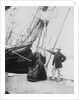 Photograph of John and Ann Gambles standing by the bow of the 'Ann Gambles' barque by unknown