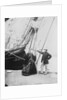 Photograph of John and Ann Gambles standing by the bow of the 'Ann Gambles' barque by unknown