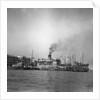 'Wing Sang' (Br, 1938), at anchor, surrounded by small craft by unknown