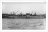A starboard broadside view of the tanker 'British Prestige' (1931) lying in port, alongside other vessels by unknown