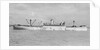 The 'Manchester Progress' (Br, 1938) under tow in port, topmasts struck by unknown