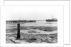 A view looking from the shore towards Shotley pier at low tide by Smiths Suitall Ltd.