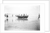 Five fishermen carrying a Sheringham crab boat up the beach, assisted by three boys, at Lowestoft by Smiths Suitall Ltd.