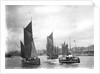 The trawler 'LT372' under sail with 'LT205' in tow of the paddle tug 'Imperial' (1879) leaving the harbour at Lowestoft, Suffolk by Smiths Suitall Ltd.